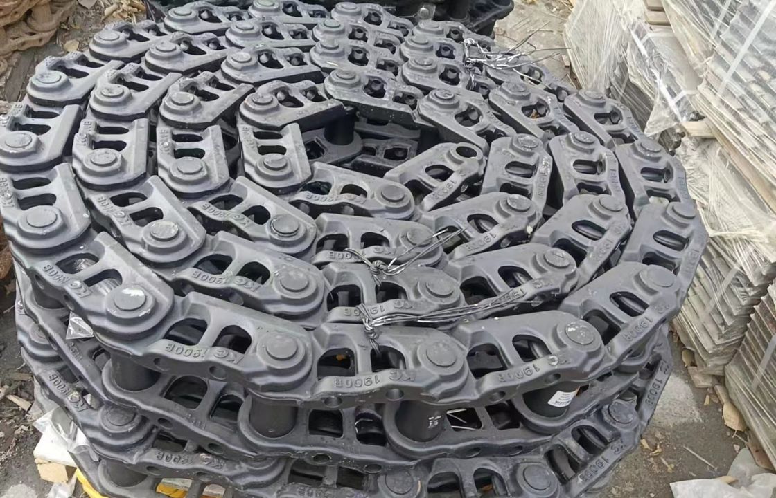 Τμήματα εκσκαφέα κάτω από το πλαίσιο Τμήματα τροχιάς σύνδεσης τροχιάς τροχιάς παπουτσιού τροχιάς κυλίνδρου άνω κάτω κυλίνδρου Sprokcet idler